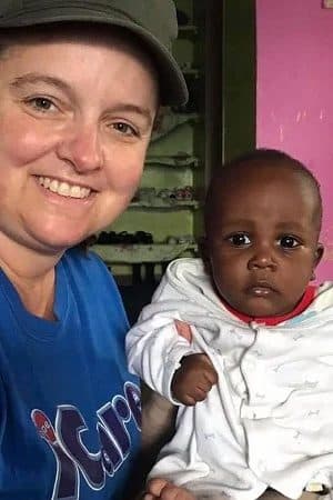 Kathy Kohl with baby Raymond during her mission trip to Kenya